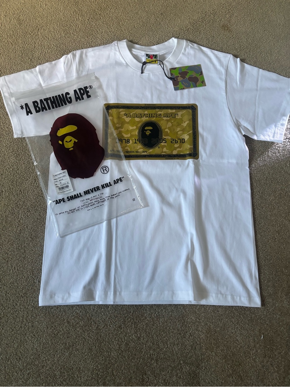 A Bathing Ape White Short Sleeve Graphic Tee - Gold Ape Credit Design